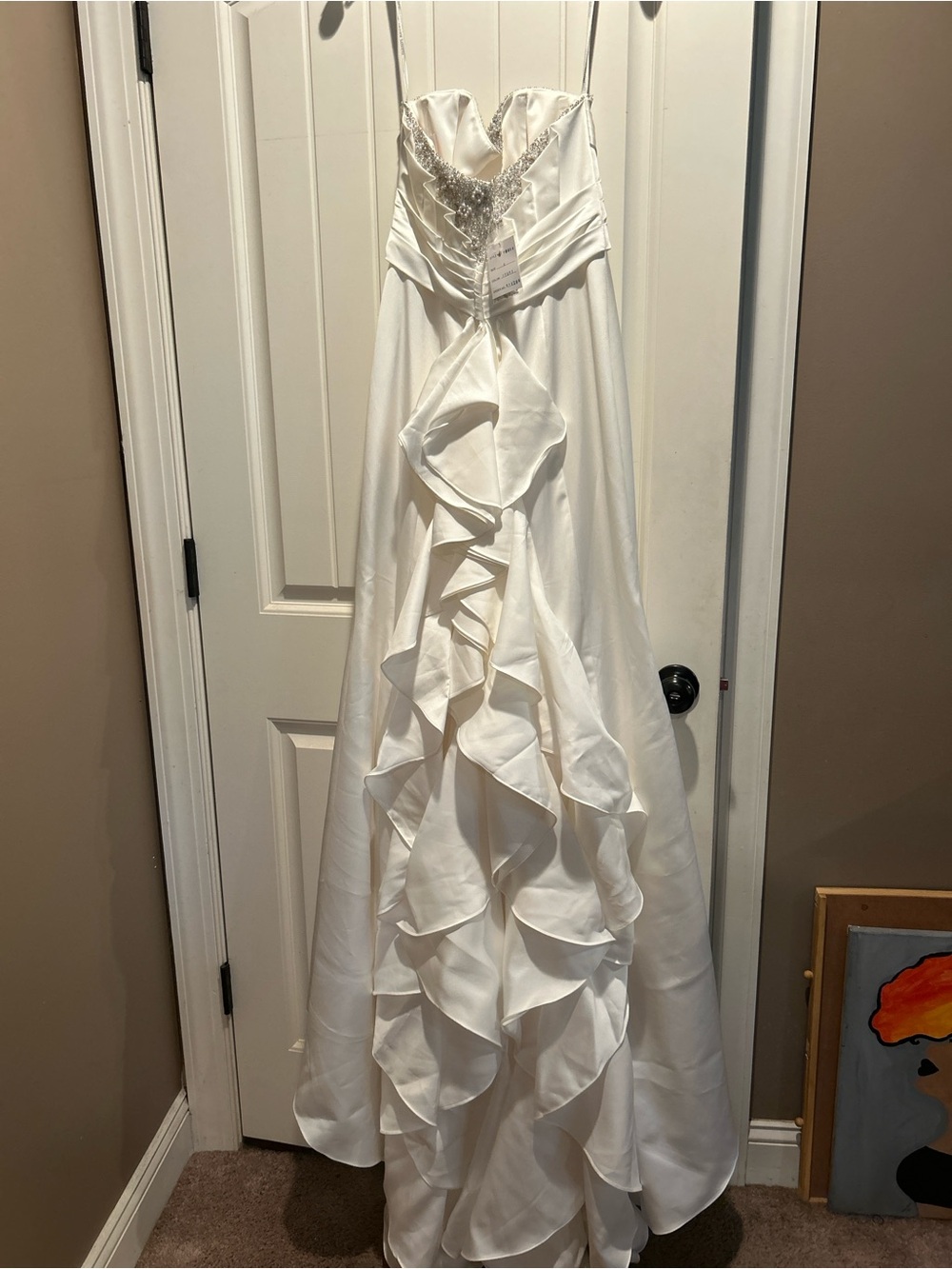 White Strapless Bridal Gown with Ruffled Cascade